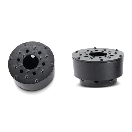 Czarna żeliwna podstawa czajnika.