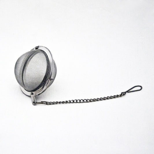 Durszlak ze stali nierdzewnej w kształcie kuli.